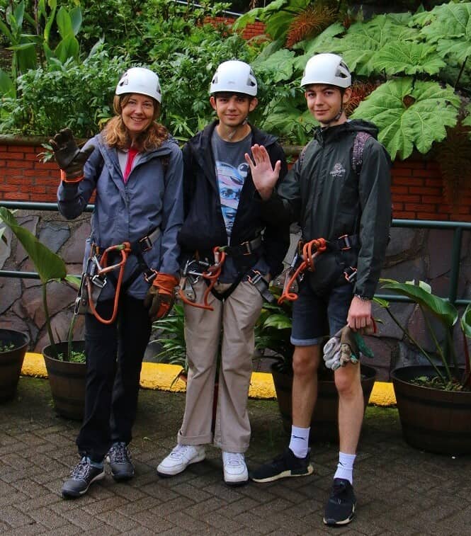 Hilary zip lining with her sons in Peru