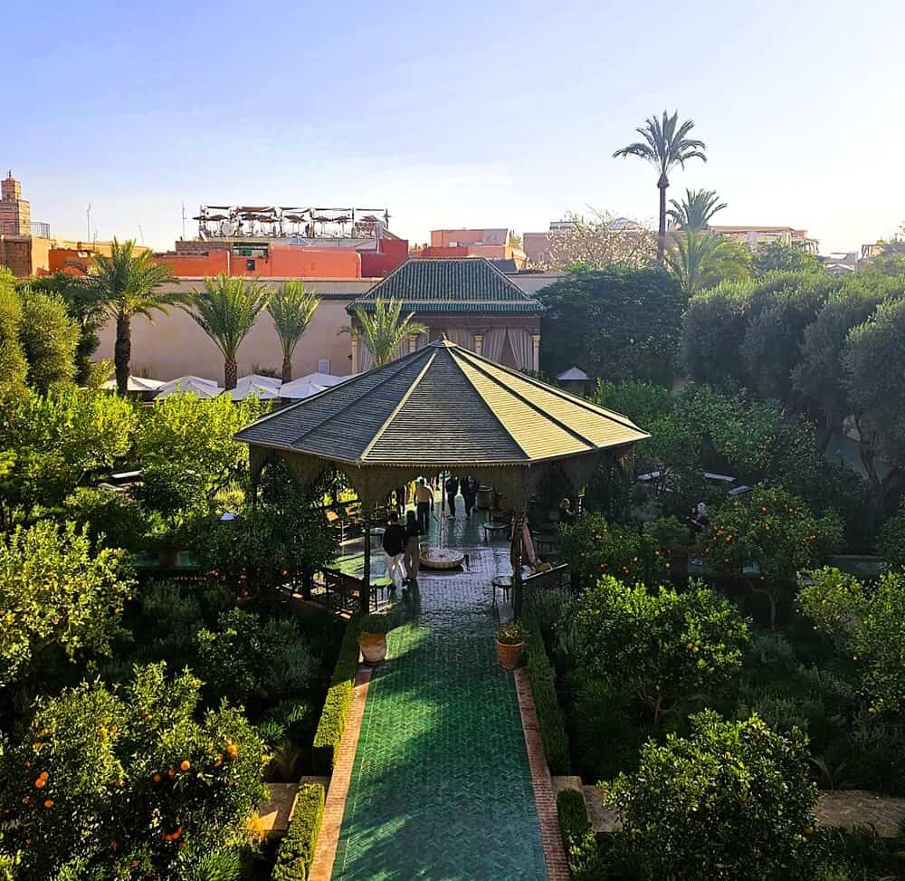 The secret garden pavilion surrounded by lush gardens  