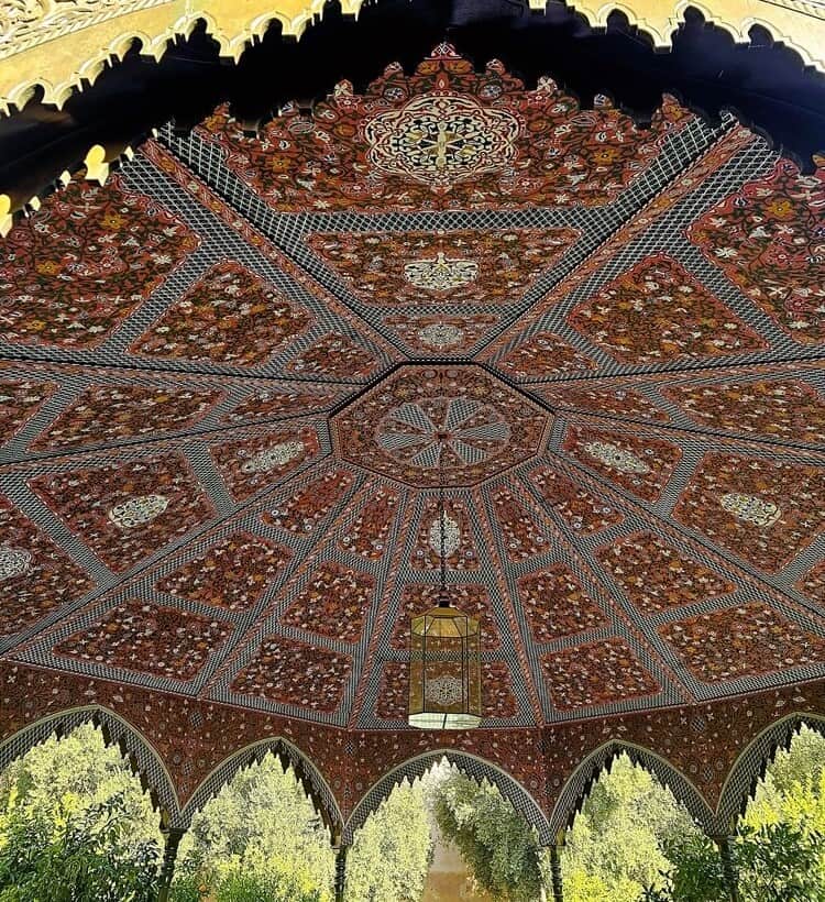 intricate tile design on the pavilion ceiling 