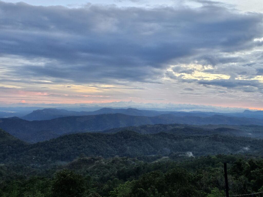 a moody sky showing a range of blues - lavender, violets at Happy Stones 
