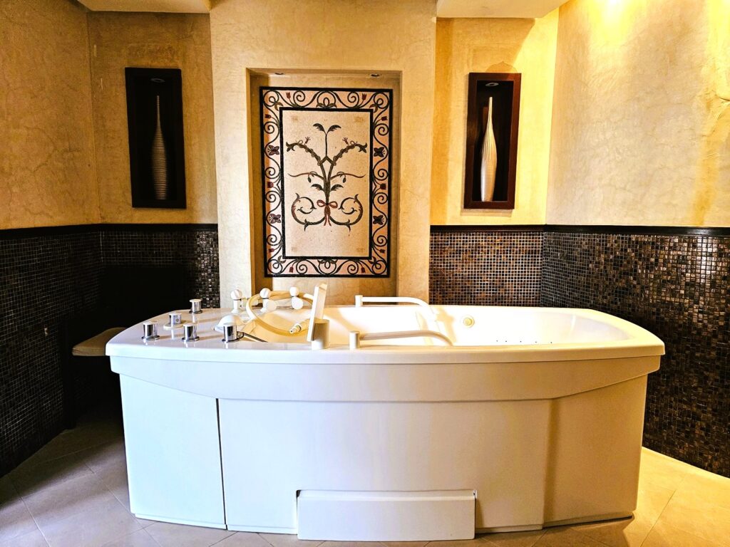 a massage bath at Mövenpick Resort & Marine Spa 
