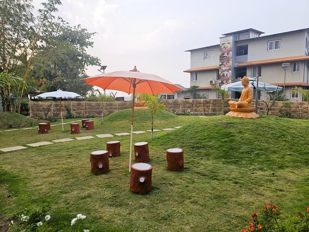 seats with Buddha at Nirvana Naturopathy Retreat and Hospital