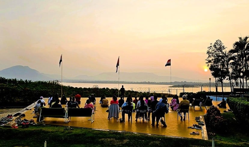 pranayama overlooking the lake at Nirvana Naturopathy Retreat and Hospital