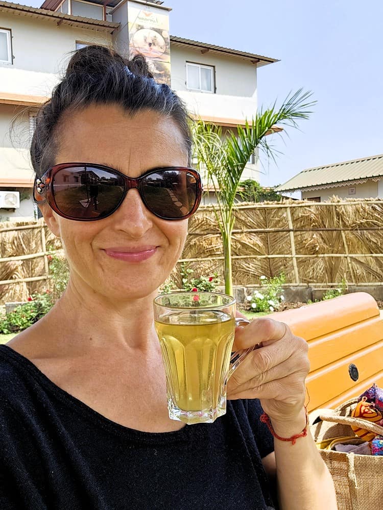 Jenny drinking herbal tea   at Nirvana Naturopathy Retreat & Hospital 