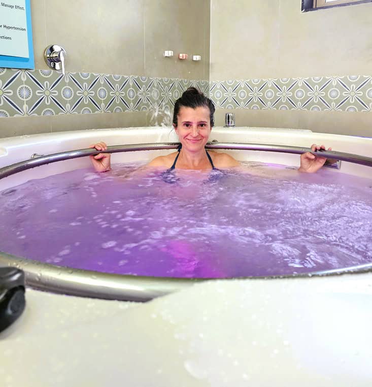 Myself in the whirlpool smiling at Nirvana Naturopathy Retreat
