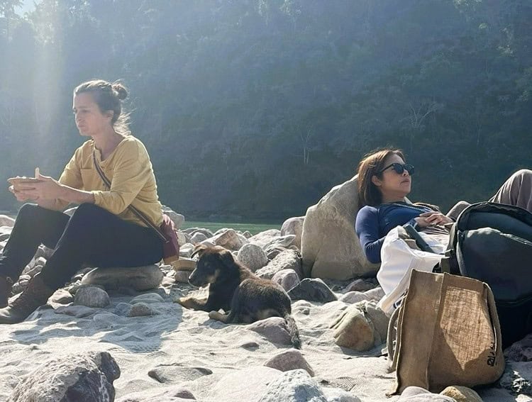 Myself and Kai lounging by the river Ganga