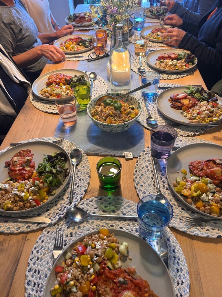 communal meals of delicious plant based food at Rosmarino Retreats for Midlife Women in Italy 