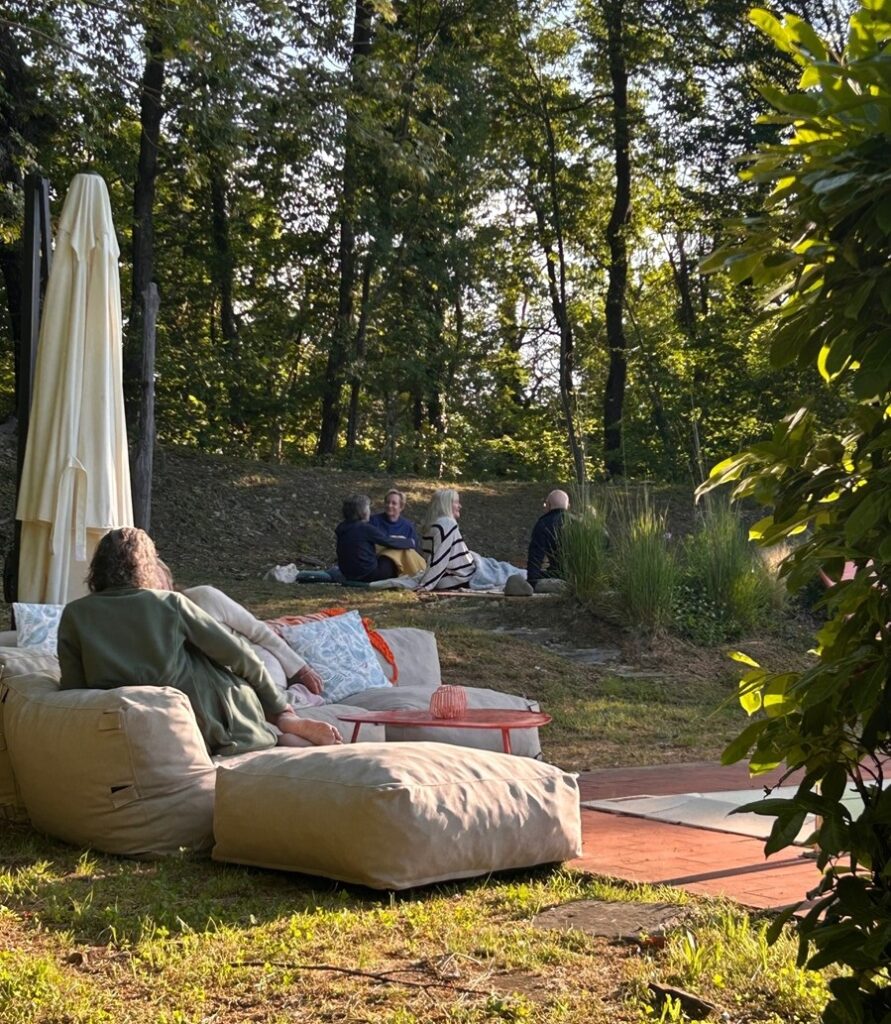 guests sitting on the floor at Rosmarino Retreats for Midlife Women in Italy 