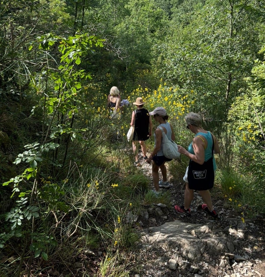 Guests walking in the countryside at Rosmarino Retreats for Midlife Women in Italy 