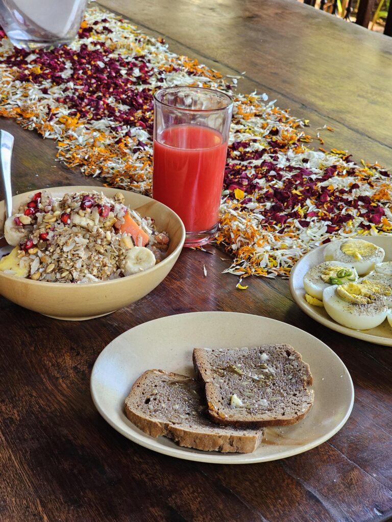 shows breakfast on the table at Ashiyana Yoga Retreat, Goa, India 
