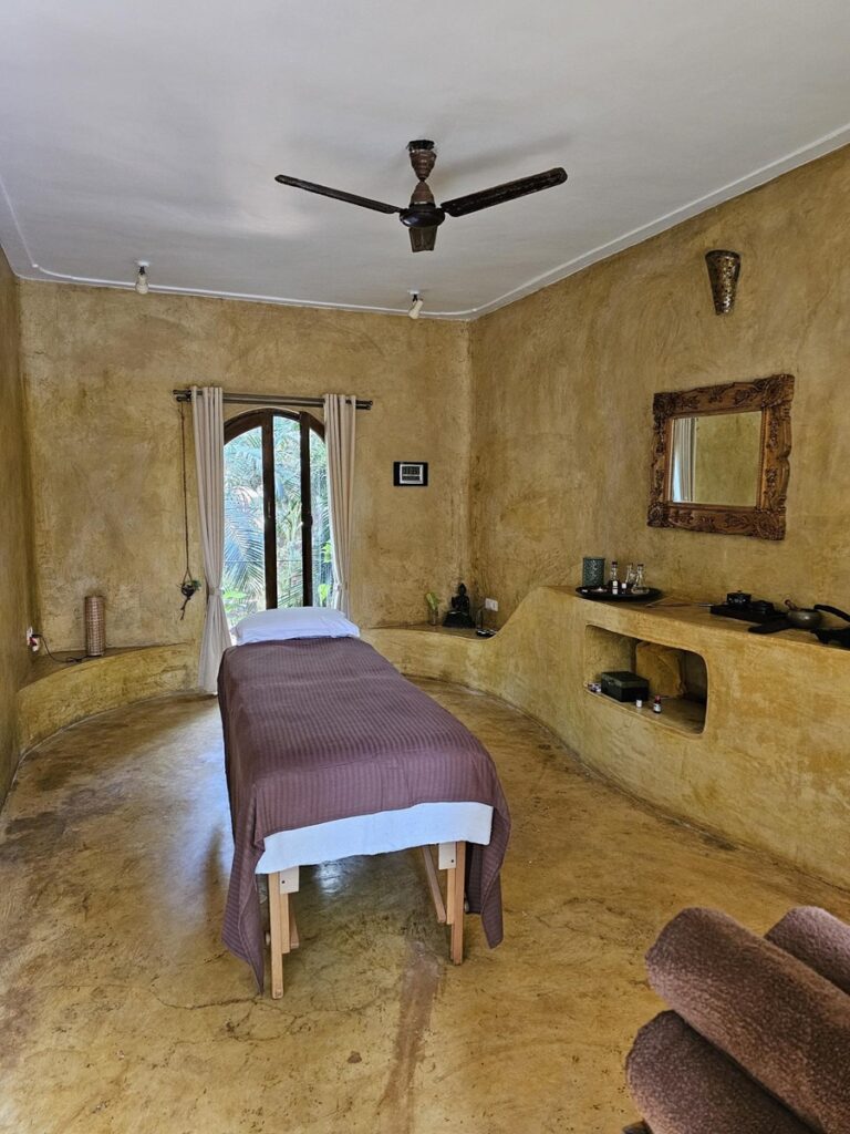 sandy coloured spa room with natural feel at Ashiyana Yoga Retreat in Goa, India 