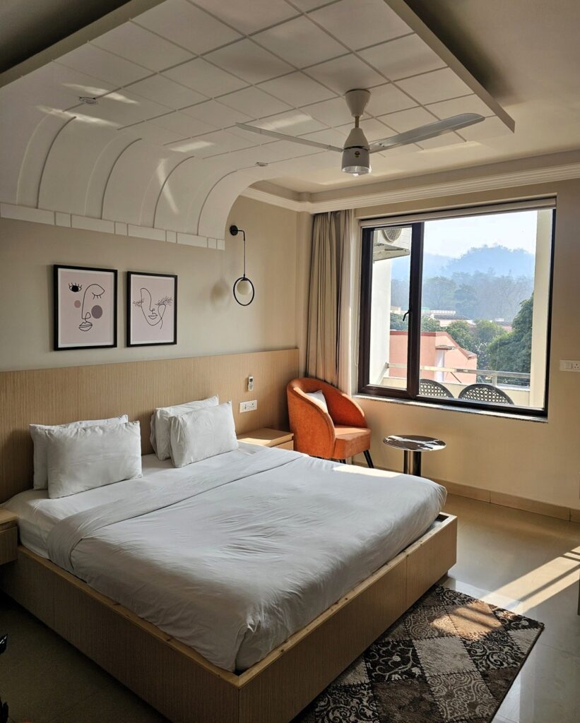 
Clean simple and stylish bedroom at Yog Vashisht Hotel, Rishikesh 