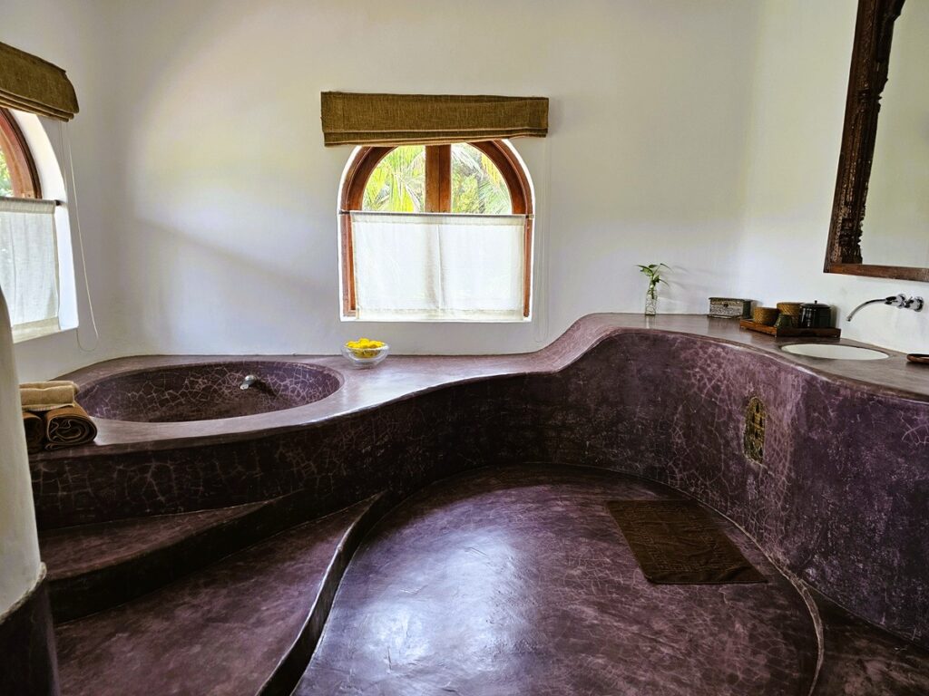 a sunken bath in the Jodhpur Room Ashiyana Yoga Retreat, Goa, India