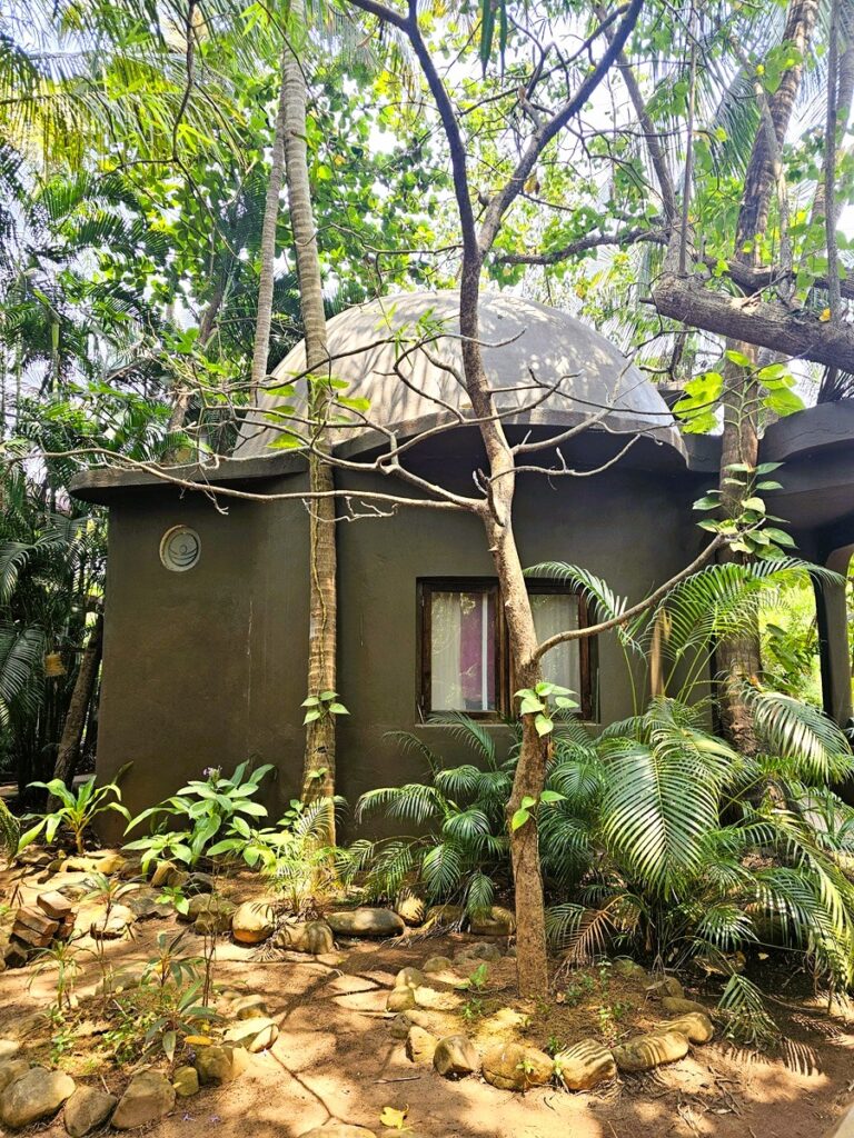 curved lines of a villa at Ashiyana Yoga Retreat in Goa, India 