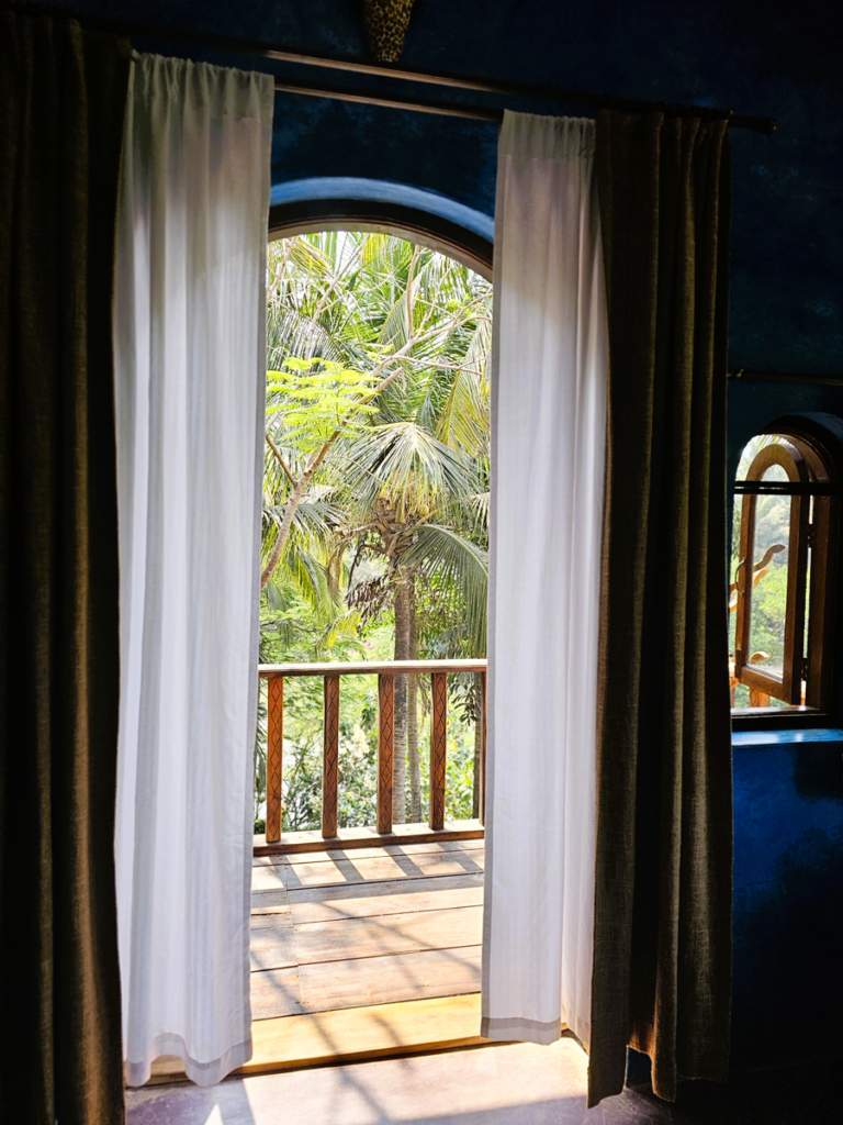 image of doorway out to the balcony of Ashiyana Yoga Retreat Goa India 
