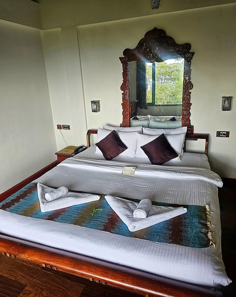 the bedroom at Blackberry Hills Hotel in Munnar