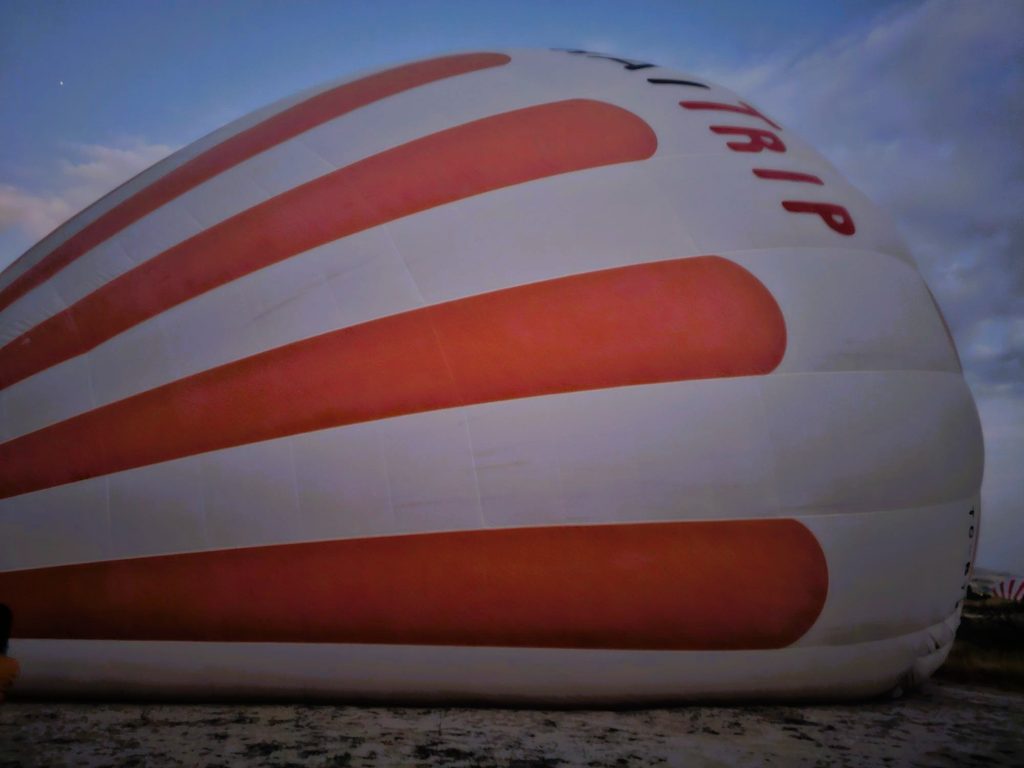 the balloon laying flat on the ground in Cappadocia