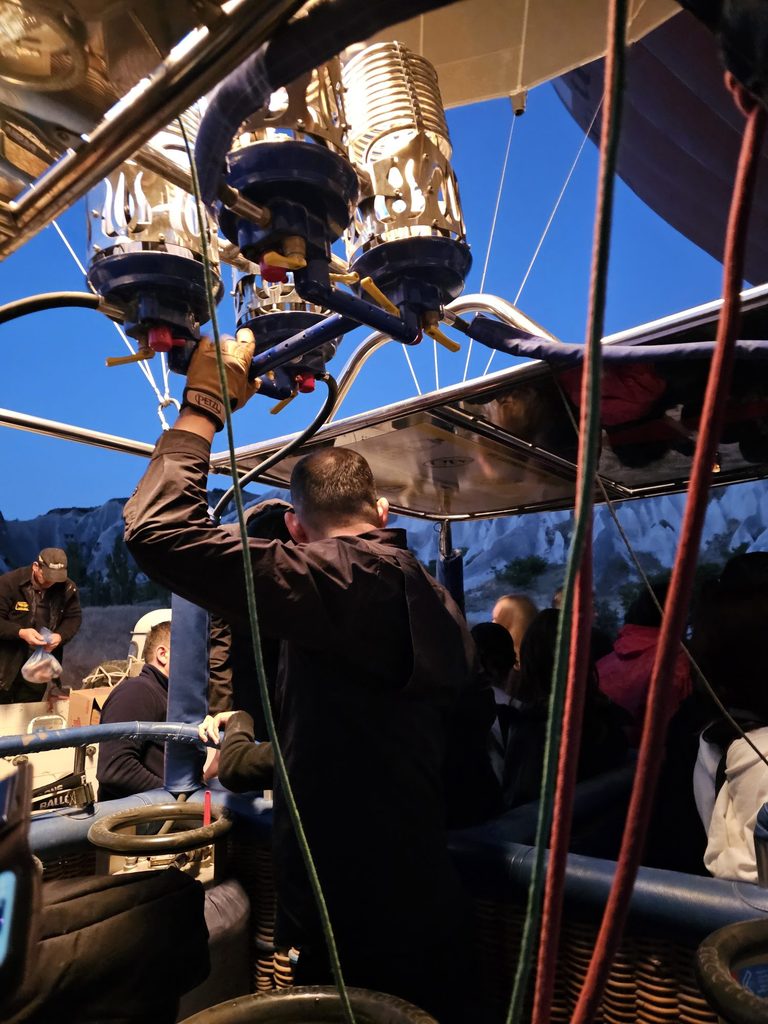 pilot of the balloon from the back