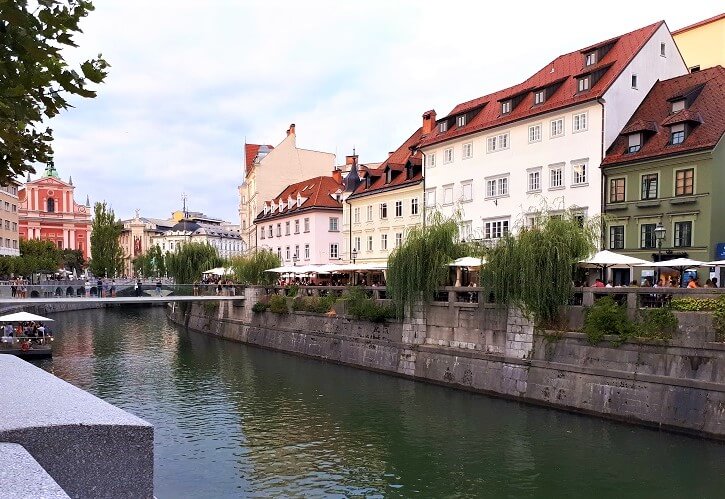 Lined with restaurants the River Ljubljanica flows through the heart of city