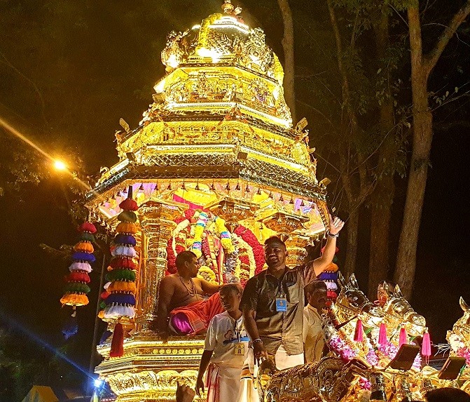 A golden chariot offering blessings.