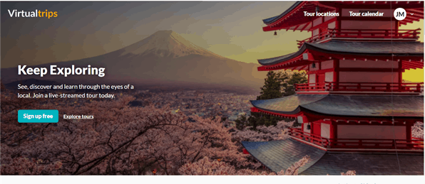 An image of the landing page for Heygo with a Japanese temple, a blanket of cherry blossom and a snow capped mountain in the distance