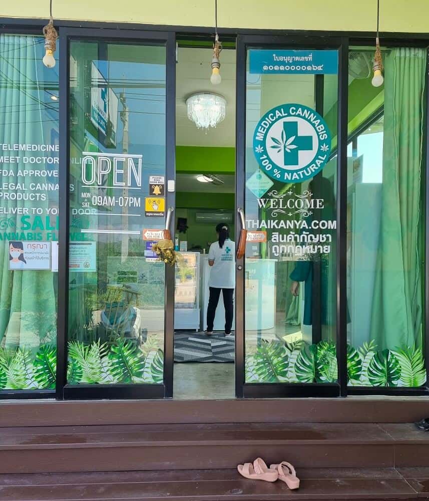 Doors of Medical Cannabis - Thaikanya - slightly ajar showing staff member inside 