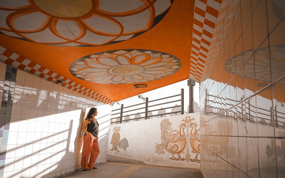 Myself in a subway, with an orange roof and brightly coloured mandalas - taken in Sri lanka 